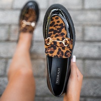 Oxfords μαύρα λουστρίνι με animal print σουέτ φάσα και αγκράφα